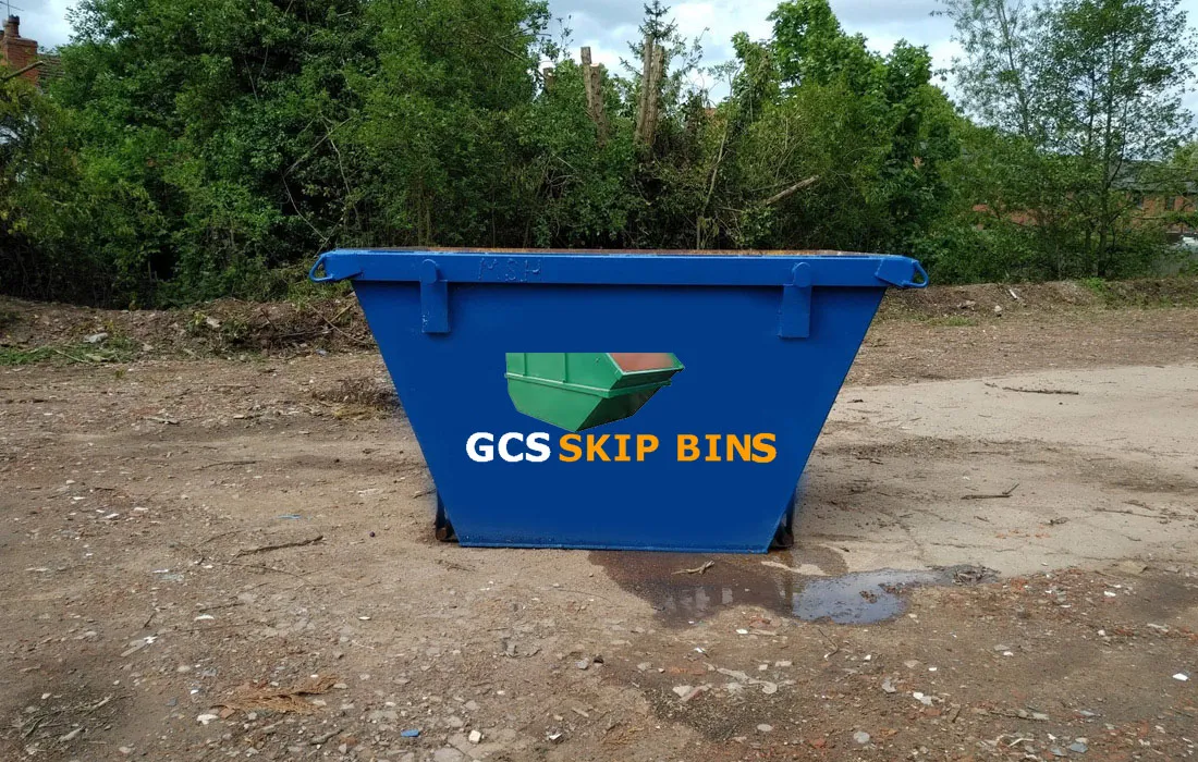 Skip bin loaded with soil and dirt from an excavation job
